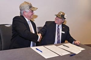 Peter Levick, President of Muskies Canada and Mark Gloutney, director of regional operations for DUC, sign an MOU to work together to protect wetland habitat Peter Levick, President of Muskies Canada, and Mark Gloutney, director of regional operations for DUC, sign an MOU to work together to protect wetland habitat