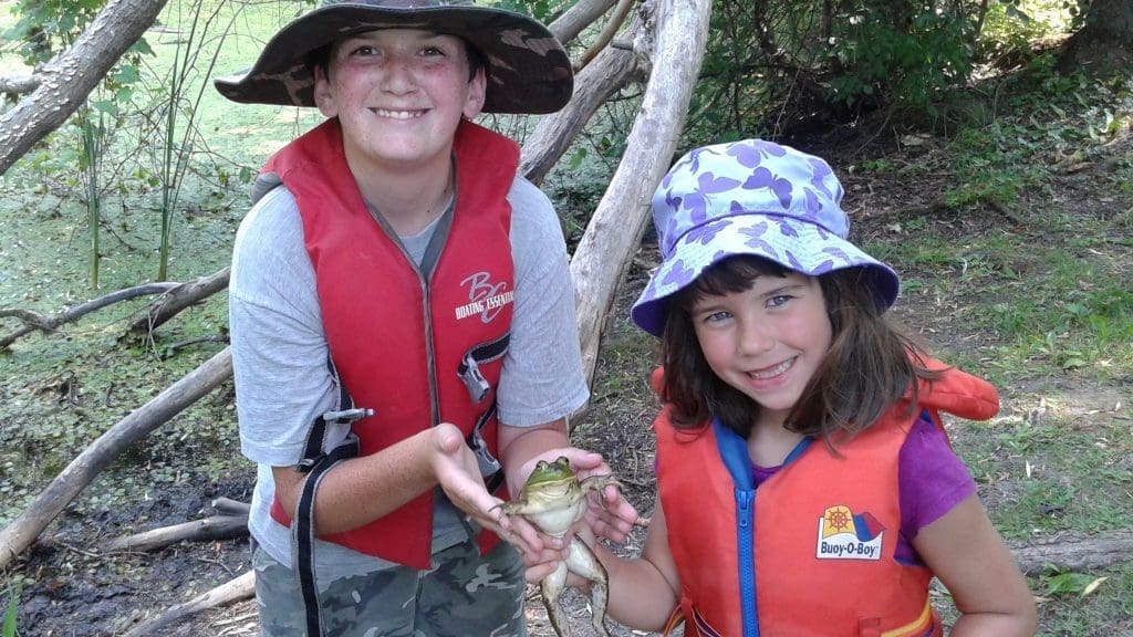 Cooper Marsh students with frog