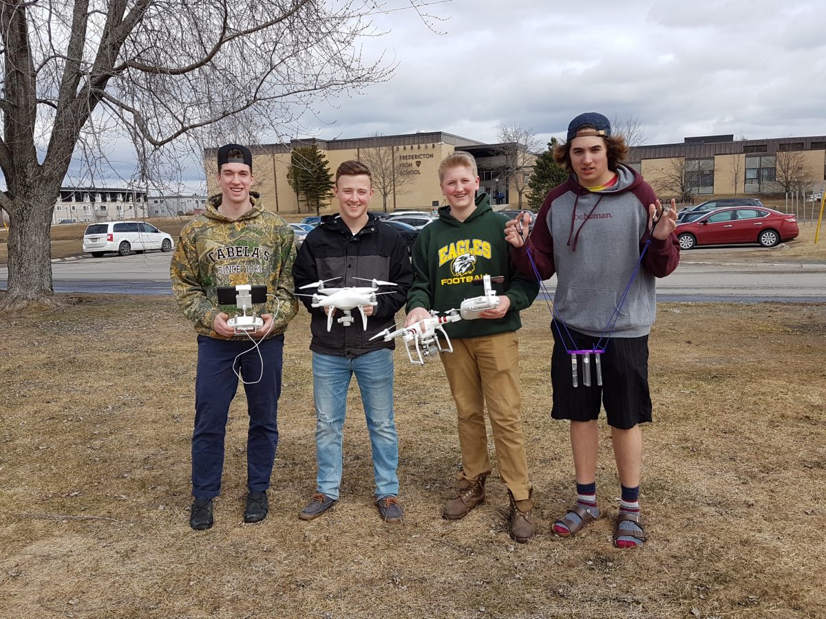 Fredericton High School students with drone.