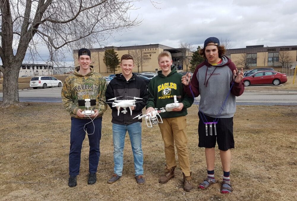 Pictured left to right are Fredericton High School students David Nash, Nathan Hoyt, Will Marshall and Brandyn Cooke. Using 3D printing and software, robotics, coding, as well as their problem-solving skills and ingenuity, this group developed a drone attachment capable of collecting water samples.
