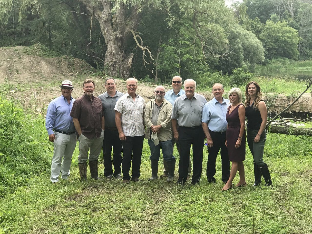 Group comes together at Hodges pond to celebrate this environmental service project