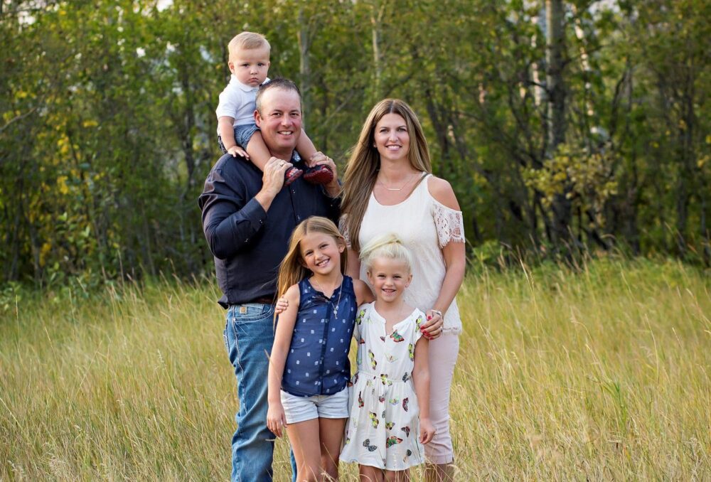 Cattle rancher Darren Keown and his family on their farmland.
