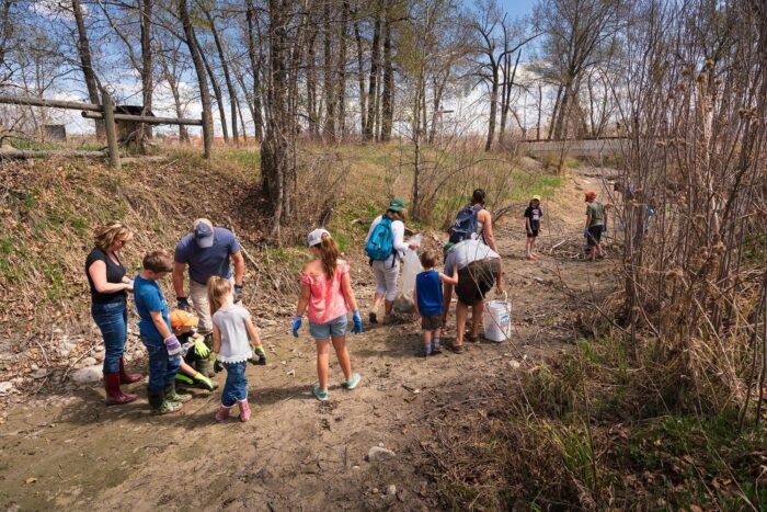 A team of volunteers picks up garbage.