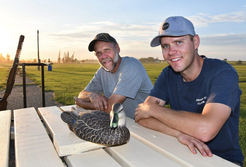 Champion trapshooters Rob (left) and Pat Lamont pose at their local shooting range with the decoy DUC presented to Rob for his 35 years of volunteerism.