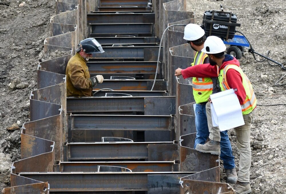 In summer of 2018, DUC visited the construction site for the South Reader outlet dam, a rebuild of a water control structure that will protect world-renowned waterfowl habitat. The project, now complete, will help to maintain 260,000 acres (105,218 hectares) of habitat—an area more than twice the size of Winnipeg.