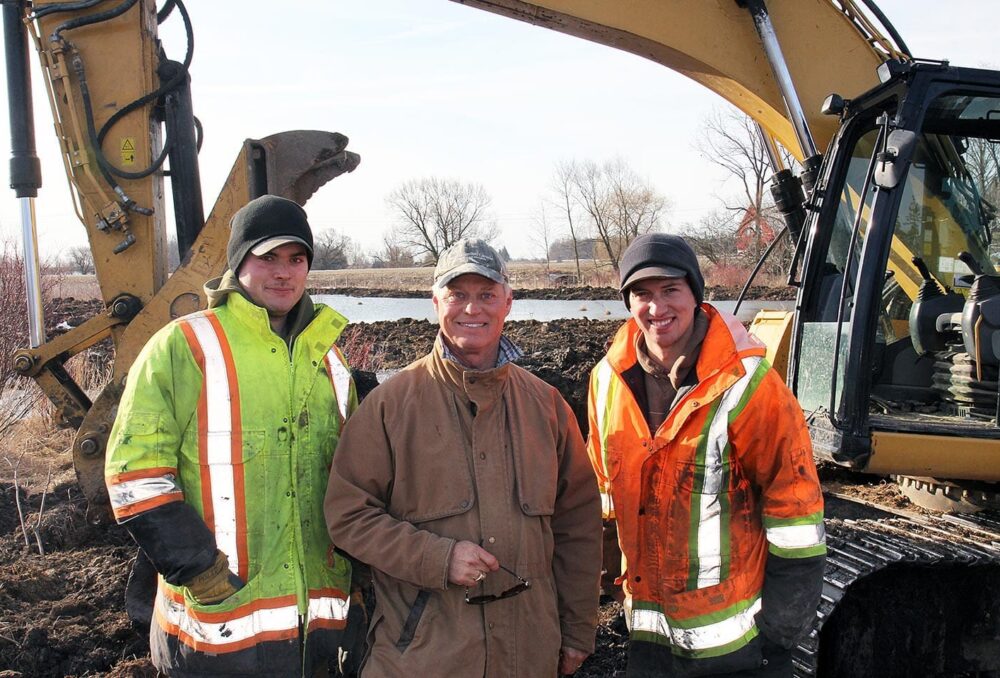 Phil Holst (centre) is pictured with Watts Excavating operators Chad Hill (left) and Nick Sweazey (right). Thanks to the training he received on our project, Chad is also encouraging a third DUC project on our farm. Company owner Steve Watts entered into an additional DUC agreement for his Sweaburg-area property, also in Oxford County.