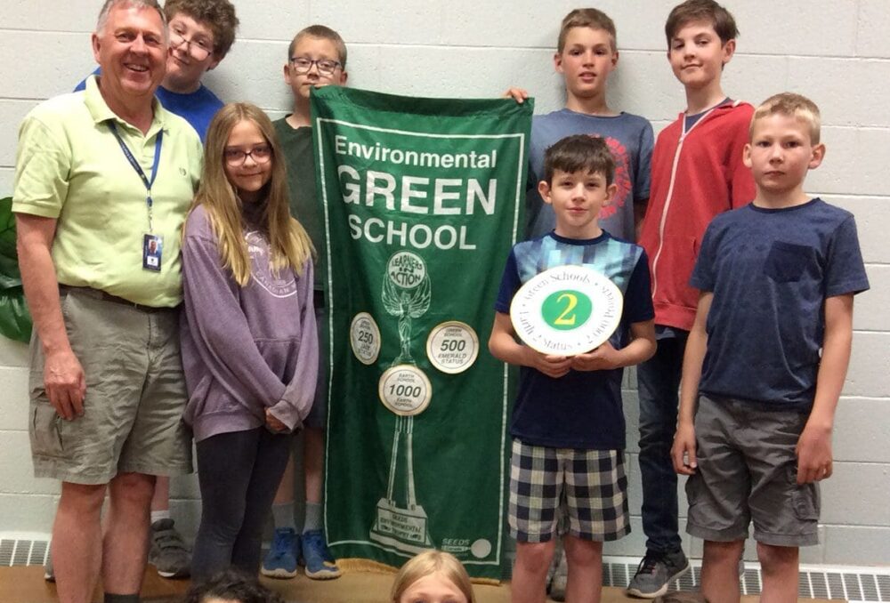 Mr. Seidel (L) and the students of Reed Ranch School are cultivating a culture of conservation in Olds, Alberta.