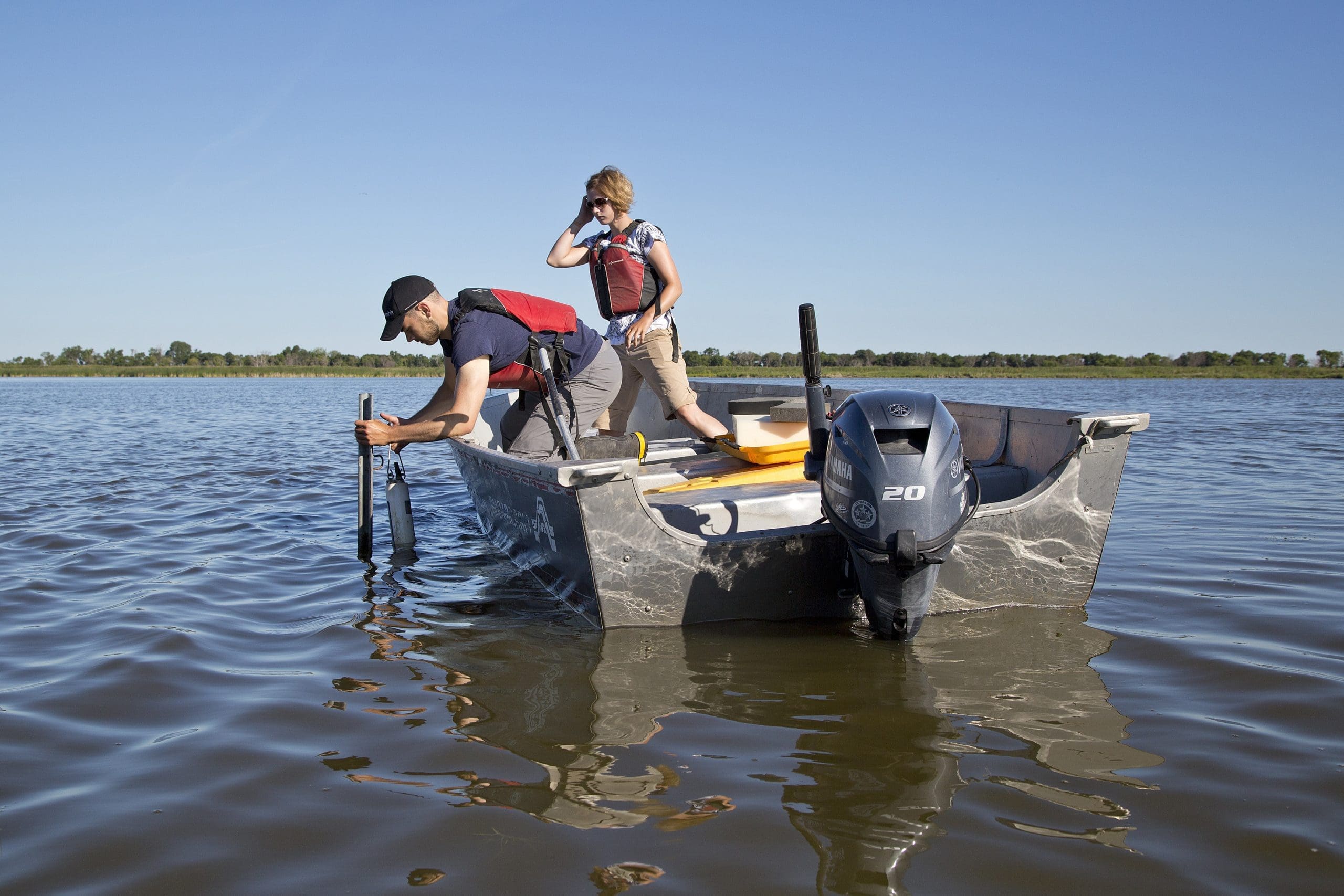 Pulling a Hydrolab from the water.