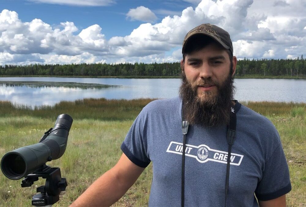 DUC conservation program specialist Zane Zondervan in the field surveying ducks.