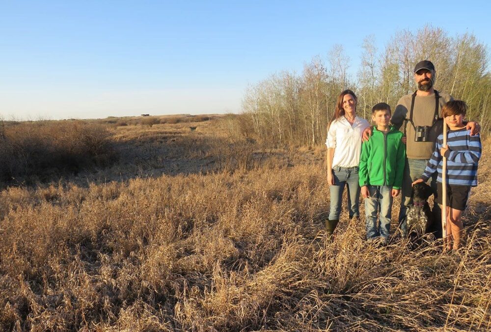 Rebecca Wilson, Louis-Pascal (LP), Jean-Michel (JM), and Jan-Sebastien (JS) DeVink (L-R) happily contributing to the future of wildlife habitat.