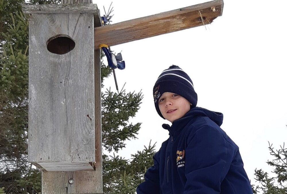 Wetland Hero Liam Mcmullen cleans a nest box at the Bill Mason & MacSkimming Outdoor Education Centre in Ottawa, Ont.