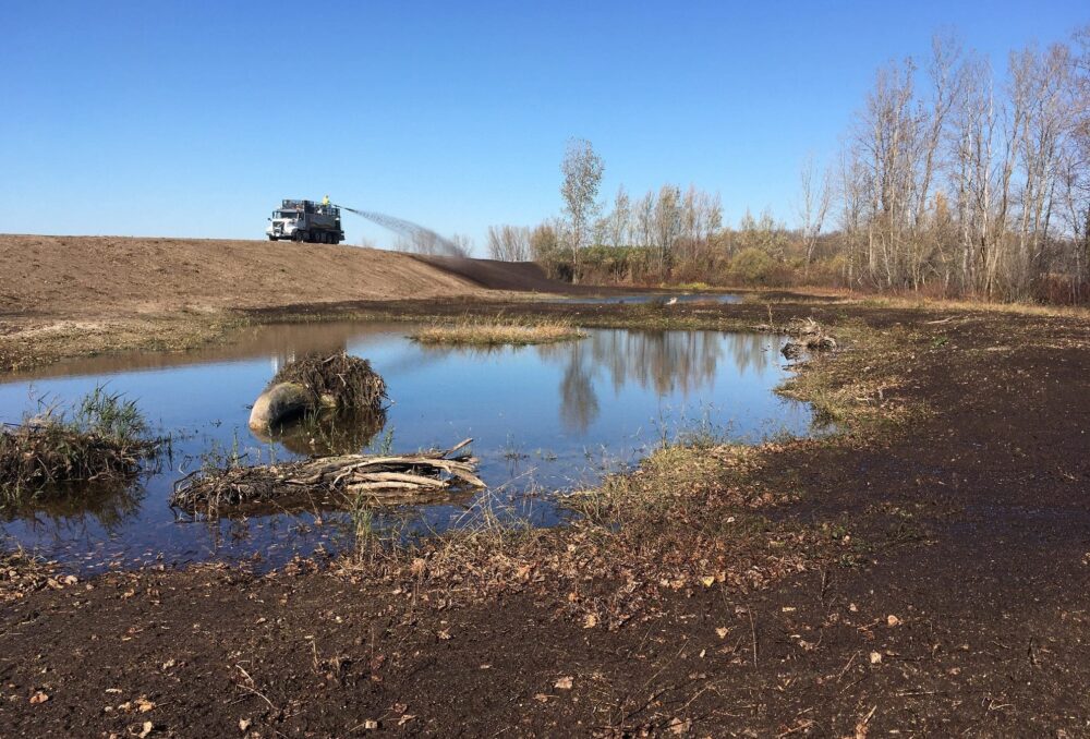 Hydroseeding with native plants at the new wetland habitat