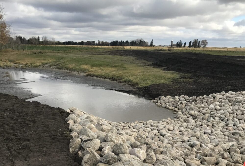 DUC engineered a rock chute as part of the restoration project to prevent further drainage. 