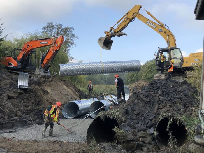 A DUC construction crew works on increasing fish passage on Gunn Island in the Fraser River estuary. The work is part of DUC's Coastal Restoration Fund work initiated by the federal government.