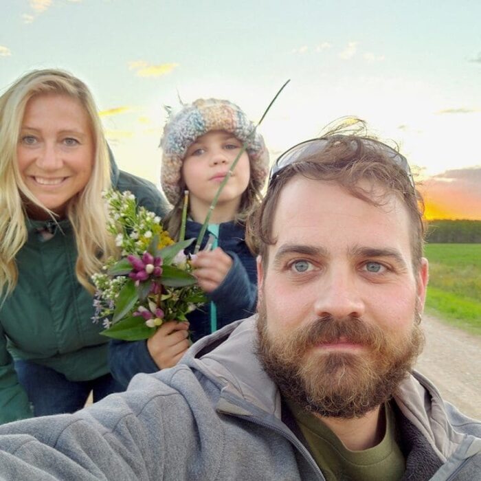 DUC volunteer Kyle Waczko with his daughter Danika and wife Rebecca.