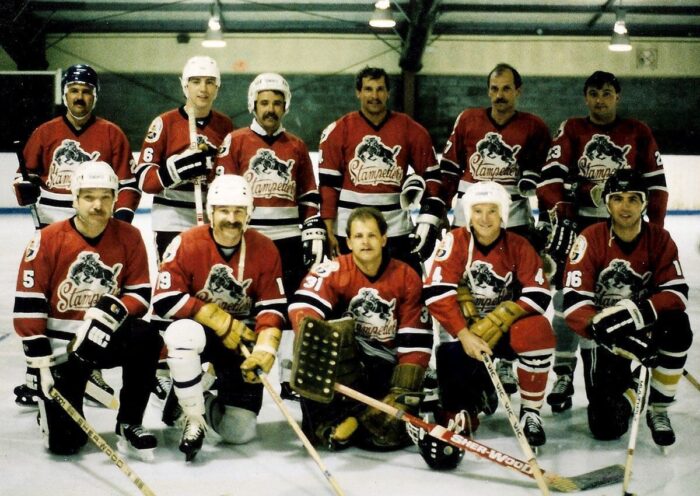 Paul Usher, back left, with his fellow DUC friends playing hockey in Alberta.