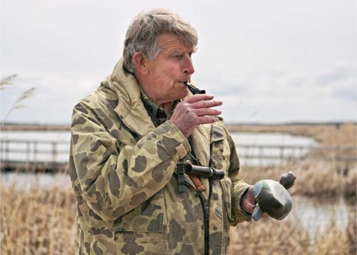 Dr. Frank Baldwin teaching waterfowl calling techniques at Oak Hammock Marsh.