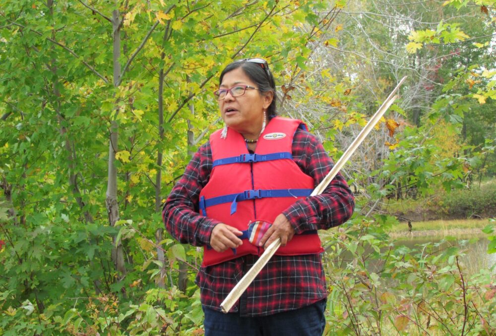 Cecelia Brooks speaks to the wild rice harvest participants.