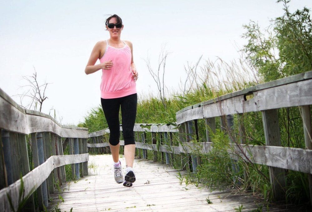 Writer Amanda Hope enjoys a noon-hour run along the boardwalk trails of Oak Hammock Marsh, Manitoba.