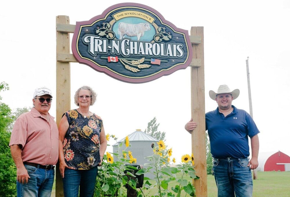 Jesse Nykoliation (r) with his parents Mervin and Joanne at their ranch near Kenton. 