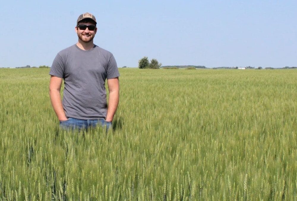 DUC specialist Alex Griffiths inspects winter winter at the Higgott farm near Newdale, Manitoba, in 2021.