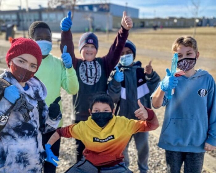 Students spend an afternoon cleaning up trash on school property