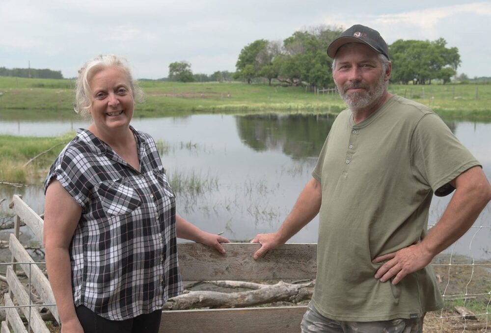 Angela and Tony Prynne on their farm near McAuley, Man.