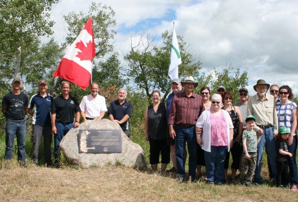 DUC staff and members of the Fowler family celebrate the dedication of the Fowler Project