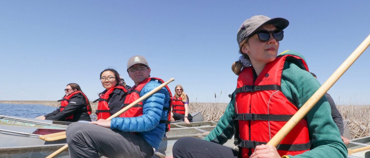 Youth Advisory Council members in canoes