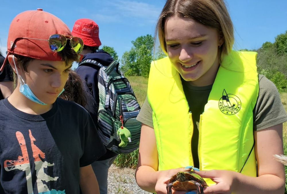 Students at the Papineau WCE learning about reptiles at Plaisance National Park