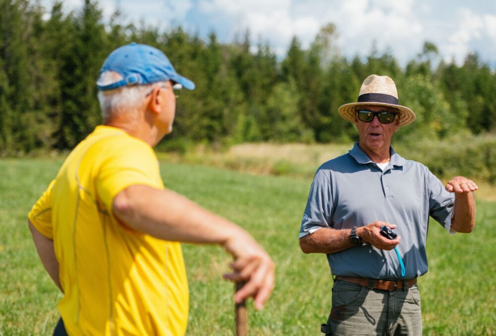 DUC biologist David McLachlin speaks with a project landowner in Elmvale, Ont.