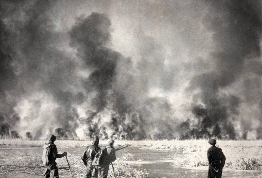 A dried-out Waterhen Marsh is ablaze, 1937