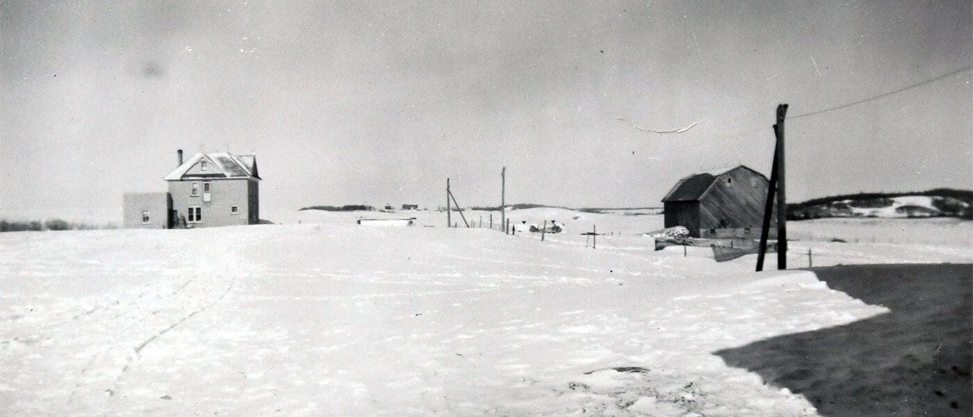 Undated photo showing house and barn built by Johann Jonson after homesteading near Baldur.