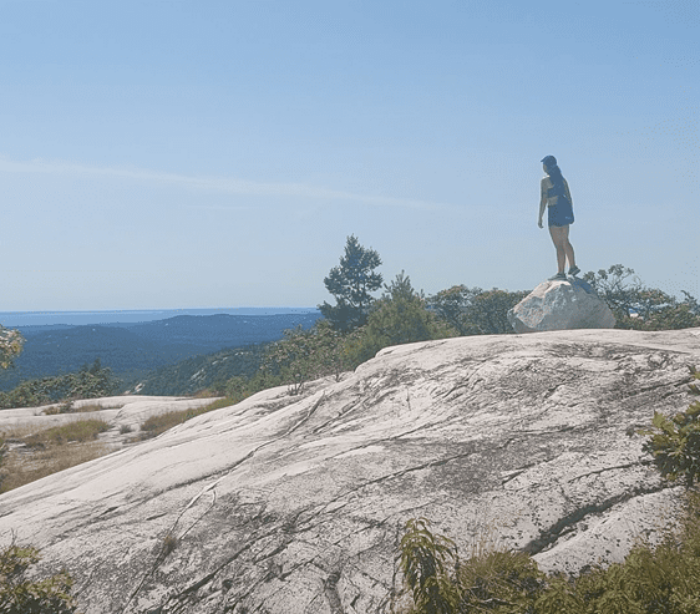 Ecclestone taking in the stunning view at Killarney Provincial Park.