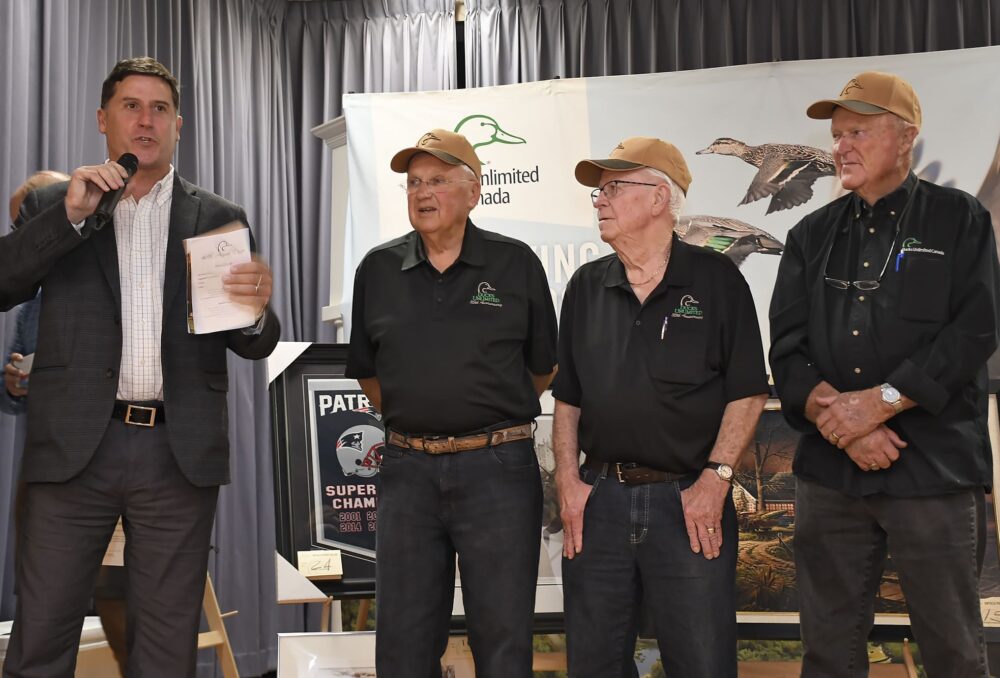 (Left to right) Tim Binch presents 50-year volunteer certificates to DUC volunteers Herb Kebbel, Percy Whitcroft and Dr. Duncan Sinclair at the Aylmer, Ontario dinner on October 11, 2023