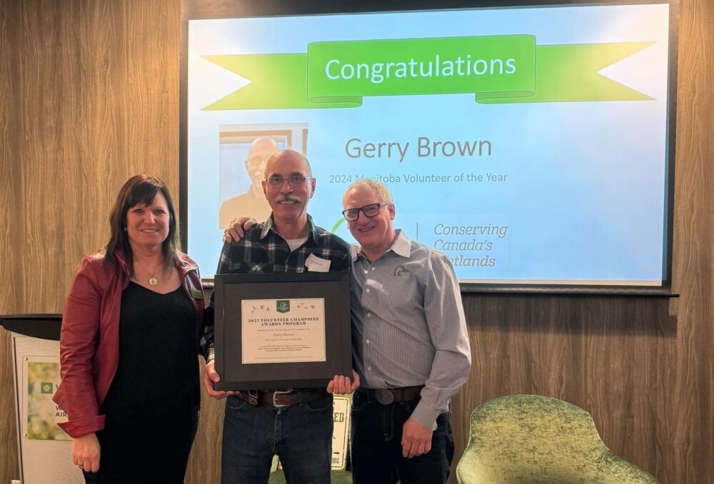 Gerry Brown, centre, was honoured at a DUC provincial volunteer celebration in February 2024. Left: Tracey Machan, co-chair, DUC Manitoba Provincial Volunteer Council, right: Brad Porath, DUC manager of event and corporate fundraising, Manitoba. 