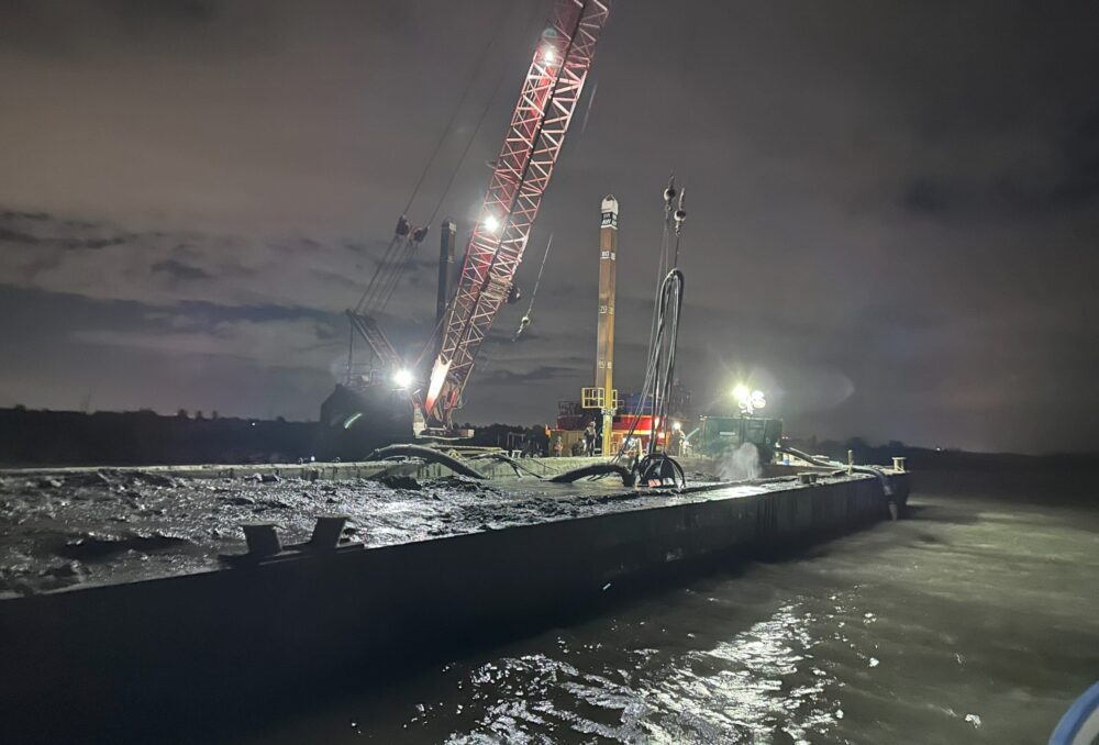 Sediment dredged from the Fraser River waits on the barge before it is redistributed to the pilot project site on Sturgeon Bank. Photo taken at 3:00 a.m., Sept 20, 2024