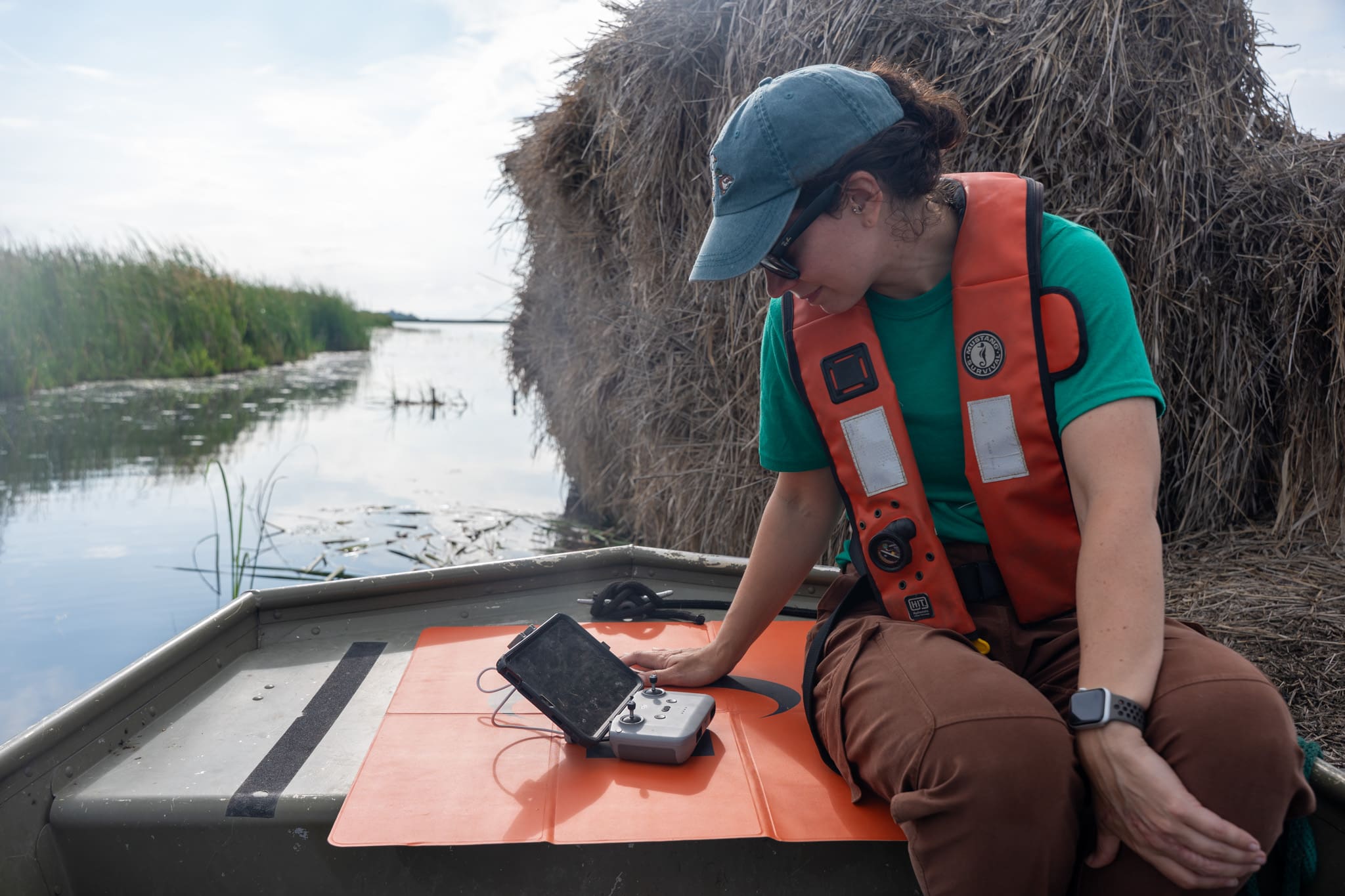 Women researching water chestnuts