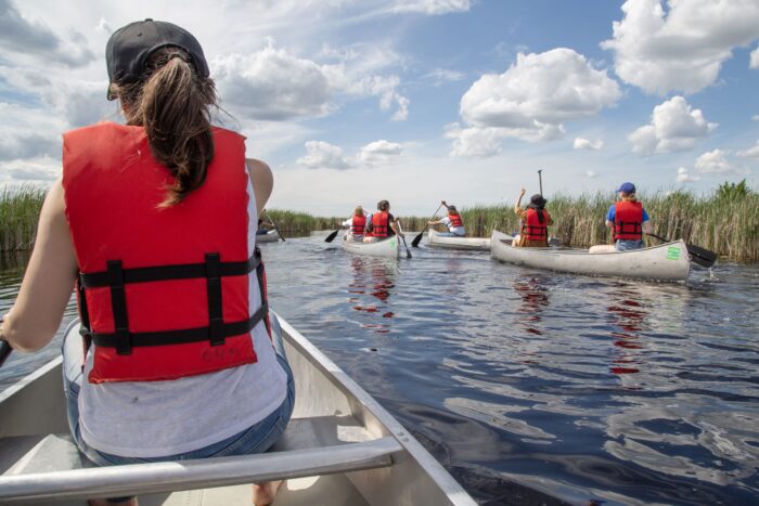 Group canoeing at Oak Hammock Marsh.