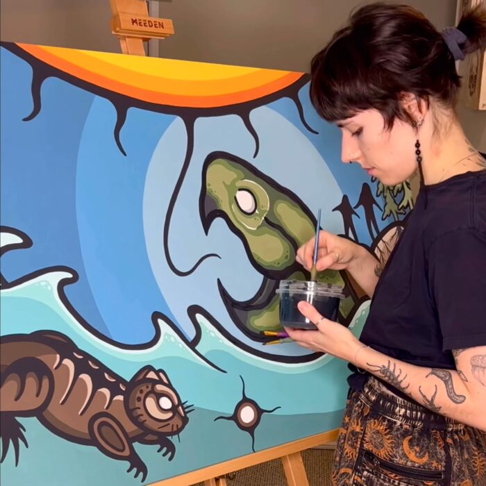 Justine Proulx highlights art styles such as the Woodland style, the most prominent Indigenous art tradition in the Great Lakes region. 