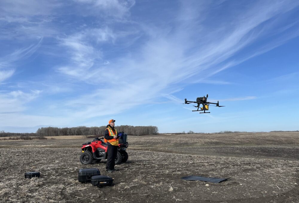 DUC employee launches drone at Burgess RCLP project near Minnedosa, Manitoba. Credit: Scott Henowitch